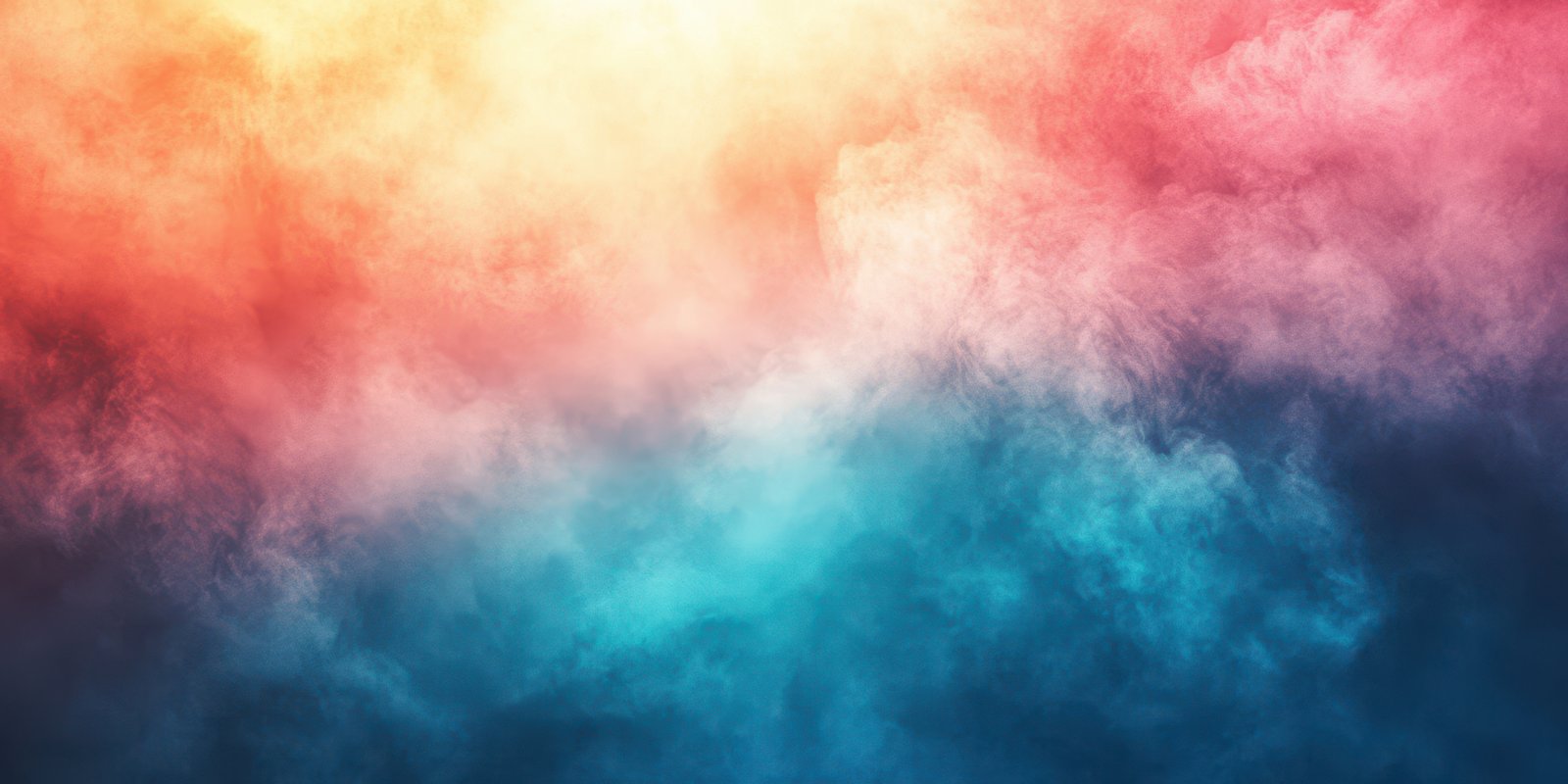 Colorful abstract smoke blending red, orange, and blue tones with soft gradients during twilight hours